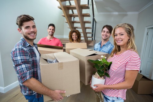 Removal team helping with a Barnes house move