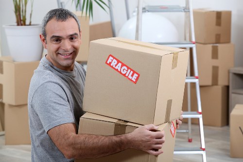 Removal van being loaded outside a Barnes property