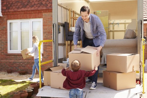 Barnes Removals team sorting reusable household items for recycling and charity donation
