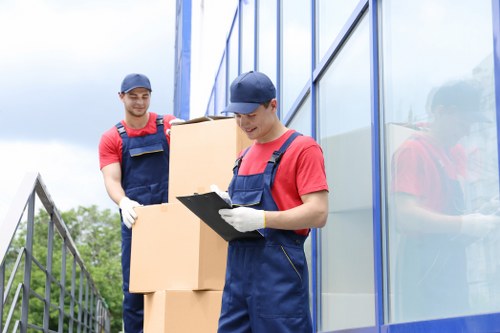 House removalists planning a move in Barnes with boxes and furniture