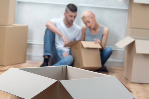 Local removals team handling furniture with care in Barnes