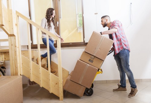 Local movers handling furniture near Barnes homes