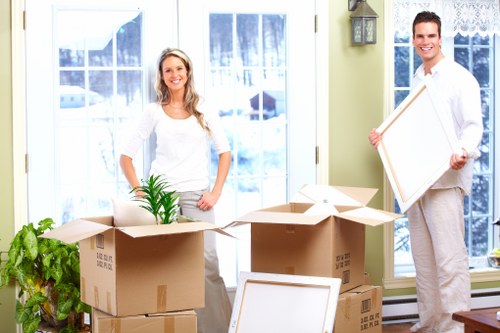 Loading furniture into a local moving van in Barnes