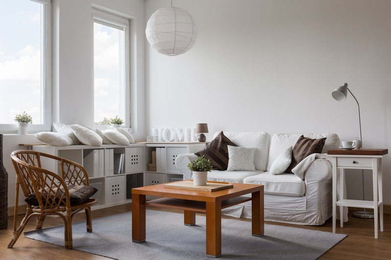 Professional movers handling boxes and furniture for a Barnes relocation